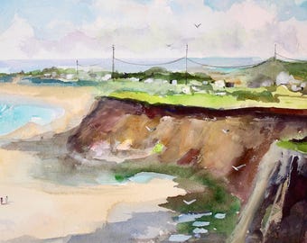May include: Watercolor painting of a coastal landscape featuring a sandy beach, turquoise water, and a cliffside. A lighthouse is visible in the distance. The artwork uses a soft color palette of blues, greens, and browns.