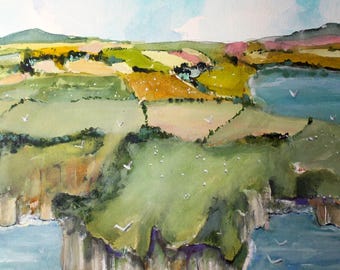 May include: Watercolor painting of a coastal landscape with rolling green hills, fields of yellow and brown, and a blue ocean. White birds and a sailboat dot the scene under a cloudy sky. The cliffs are a mix of green and brown.