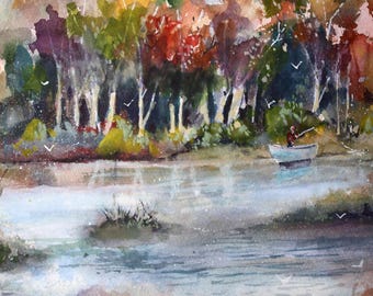 May include: Watercolor painting of a serene lake scene with colorful autumn trees. A small boat with a person fishing is in the water. White birds fly in the sky. The painting is signed "GIUFFRIDA".