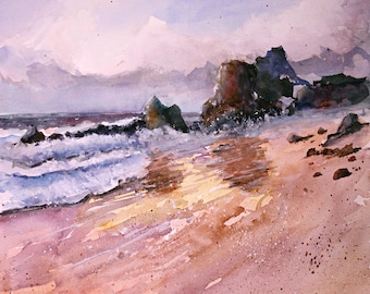 May include: Watercolor painting of a beach scene with waves crashing on the shore. The artwork features a palette of pink, purple, and blue hues, with dark rock formations and a cloudy sky. The artist's signature is in the bottom right corner.
