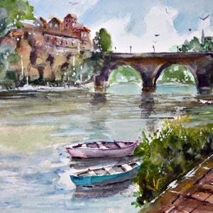 May include: Watercolor painting of a river scene with a stone bridge and buildings on the bank. Two small boats float in the water. The sky is blue with a few clouds and birds.