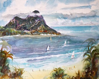 May include: A watercolor painting depicting a coastal scene with a large dark mountain rising above a blue bay. Several white sailboats are on the water, and small figures are visible on the sandy beach. Palm trees frame the foreground.