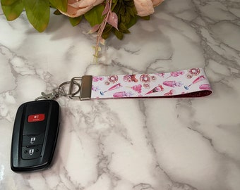 Pink Disney Ice Cream Print Faux Leather Wristlet Keychain with Bright Pink Glitter Backing