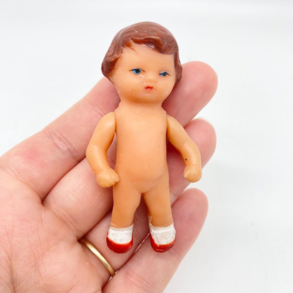 Vintage 60s Rubber German Ari baby doll - movable arms with painted socks and shoes.