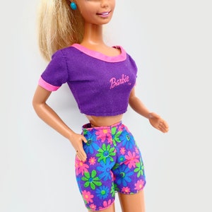 Barbie Looks Doll with Curly Blonde Hair Dressed in Ruched Crop Top &  Satiny Lavender Shorts, Posable Made to Move Body