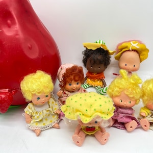 Vintage Strawberry Shortcake dolls sold seperately
