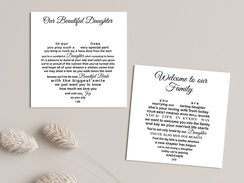 May include: Two white cards with black text. One card reads "Our Beautiful Daughter" with a heart-shaped poem. The other card says "Welcome to our Family" with a heart-shaped poem. Decorative floral elements are in the background.
