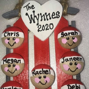 Personalized Family of 2-7 on a sled ornament