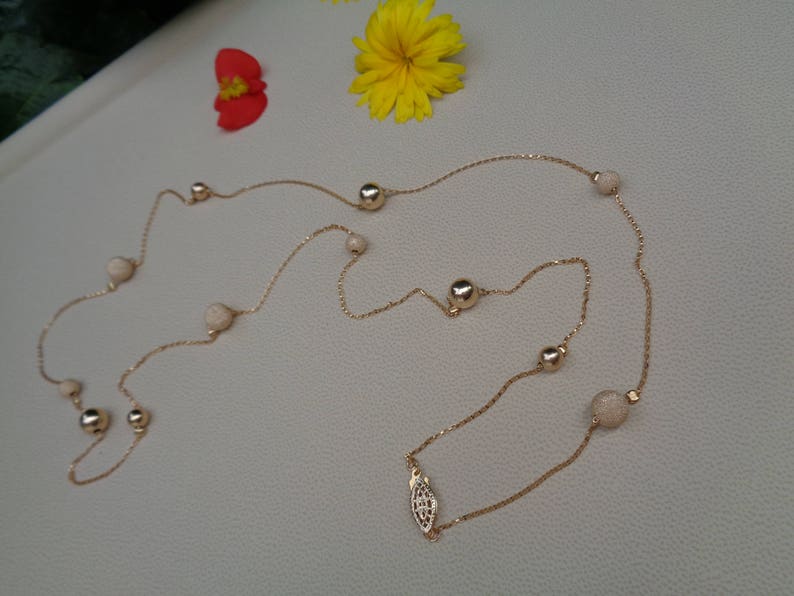 Long gold chain smooth and stardust with moving balls 585 gold filled