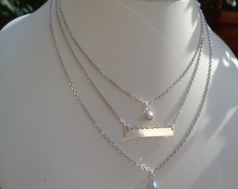 Silver necklace, three rows, with various pendants, sterling silver