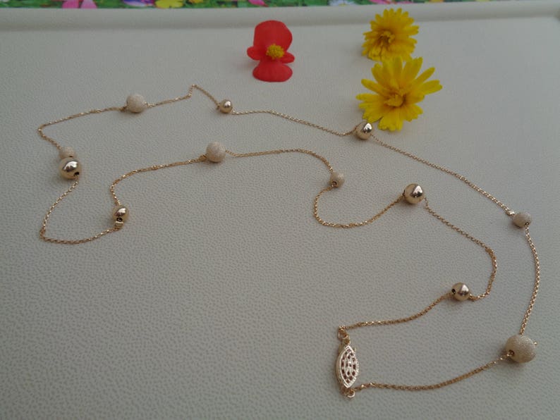 Long gold chain smooth and stardust with moving balls 585 gold filled