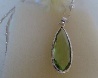 Long silver necklace with pendant, green amethyst