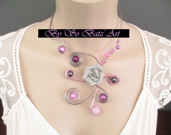 Beau collier "Granita"  fleur, perles hématites et magiques aluminium