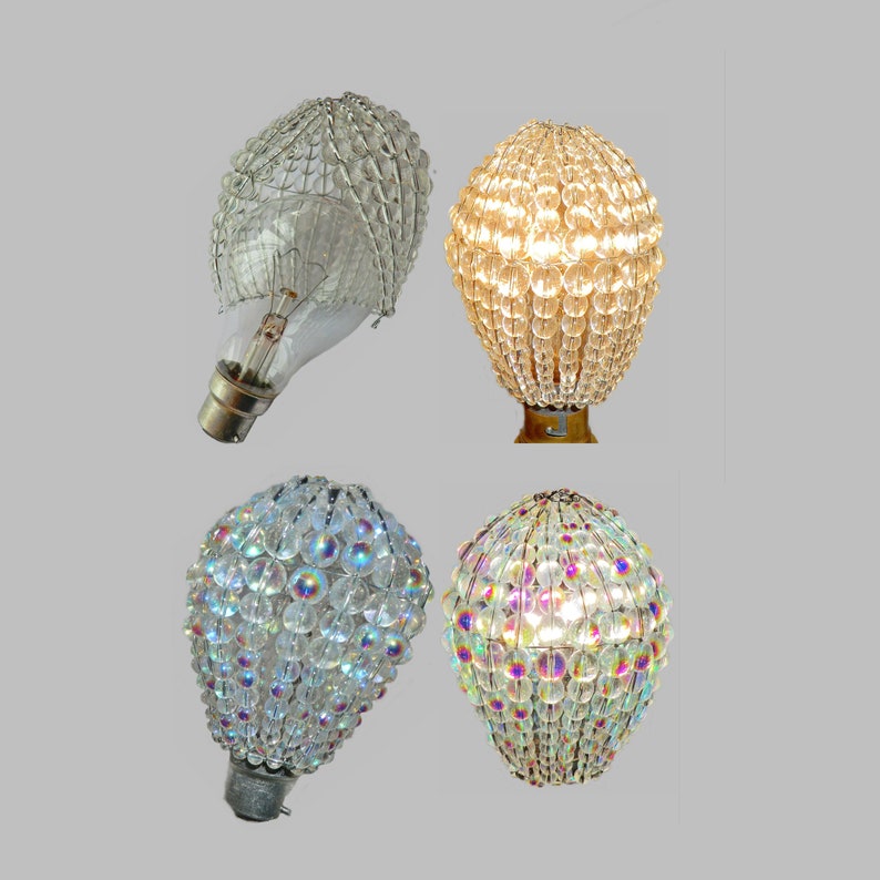 May include: Four different light bulb covers made of clear glass beads. The covers are in various shapes and sizes. Some of the beads are iridescent.