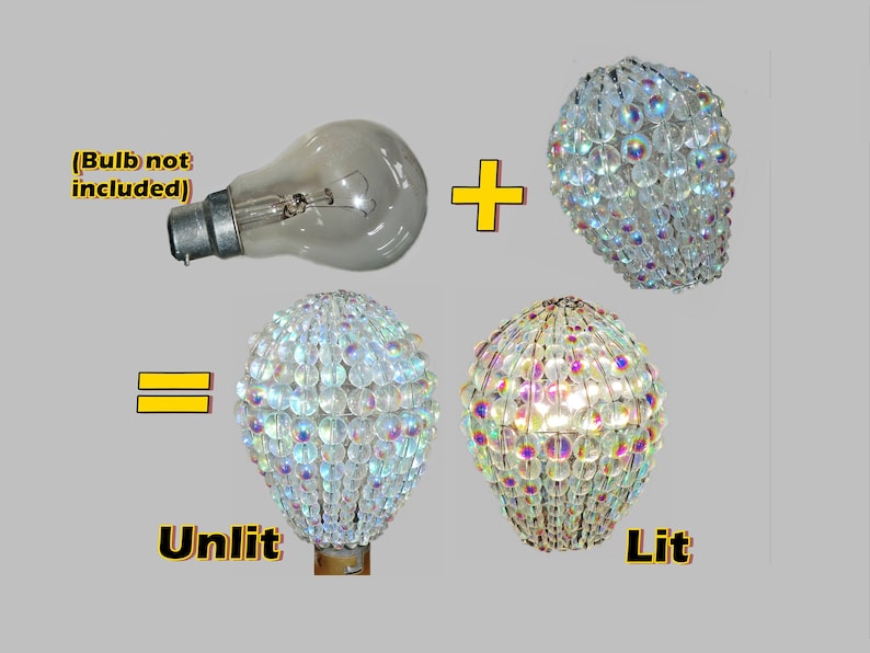 May include: A clear glass light bulb with a standard base is shown next to a crystal chandelier. The chandelier is shown unlit and lit. The text "Bulb not included" is shown above the light bulb. The text "Unlit" is shown below the unlit chandelier. The text "Lit" is shown below the lit chandelier.