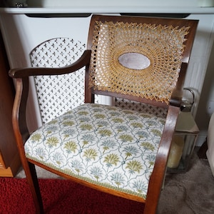 Regency style elbow chair with medallion back, recently caned