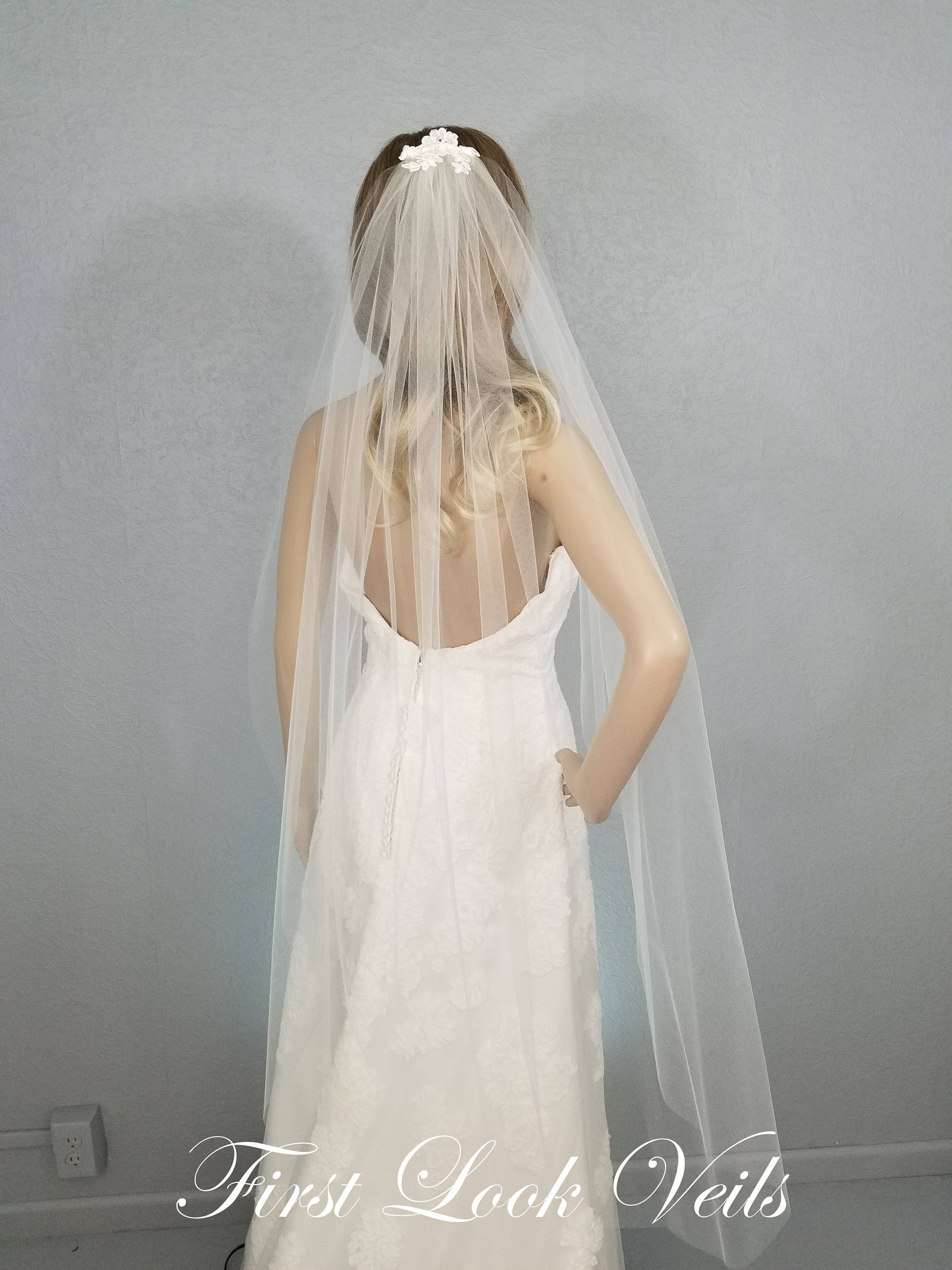 plain wedding dress with lace veil
