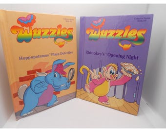 Lote de libros de tapa dura de Hasbro Wuzzles de los años 80, números 5 y 6: Hoppopotamus y Rhinokey.
