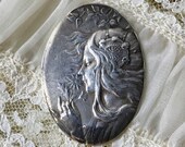 Antique and Rare, Large Sterling Silver Pendant with an 18th Century Lady, finely detailed in a repousse style, sandcast look