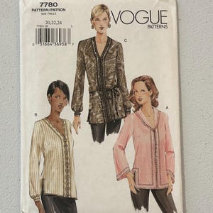 May include: Vogue Patterns sewing pattern for women's tops. The pattern features three different top designs with long sleeves and decorative trim. The pattern number is 7780, and the sizes are 20, 22, and 24.