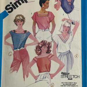May include: A Simplicity sewing pattern envelope for one-yard tops featuring illustrations of five different shirt designs. The cover displays various necklines, sleeve styles, and strap details, with text including Size 10, Time Saver Stretch Knit, and One-Yard Tops.