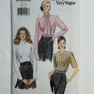 May include: A vintage sewing pattern titled "Very Easy Very Vogue" featuring illustrations of three different blouses and the pattern number 9317. The pattern size is 6-8-10.