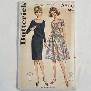 May include: Vintage Butterick sewing pattern featuring two dress designs. The pattern cover displays illustrations of the dresses, with a bust size of 38 and size 18. The price is 60c, and the pattern number is 2806.