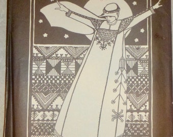 May include: Folkwear pattern number 105 for a Syrian dress. The pattern includes instructions for sewing and embroidery. The illustration shows a woman wearing a white dress with embroidery and a head covering.