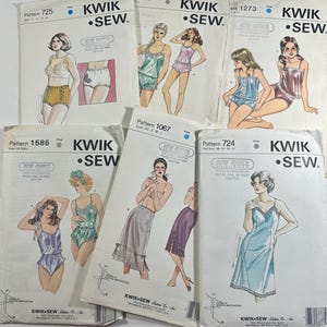 May include: A collection of six Kwik Sew paper sewing patterns featuring illustrations of lingerie, including bras, panties, camisoles, and slips. Each white envelope displays the brand name, pattern number, and size range in black text.