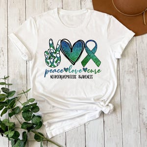 Neurofibromatosis Awareness Shirt | Peace Love Cure | T-Shirt One peice Bodysuit | Purple Ribbon | Nervous system | Tumors