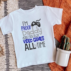 I&#39;m proof Daddy does not play video games all the time shirt | One piece bodysuit t-shirt | Little Boy | Baby Shower | Funny | Gamer Daddy