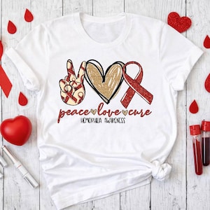 Peace Love Cure | Hemophilia Awareness month shirt | Bleeding disorder | T-Shirt