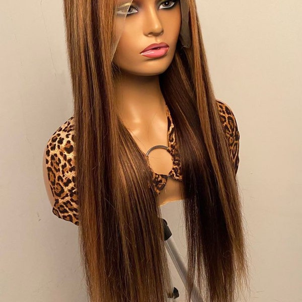Human hair wig.  Light brown lace highlight 13/4.  150 density 12A.  20 inch