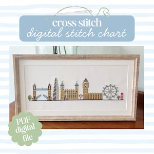 May include: A framed cross-stitch digital chart depicting the London skyline. The design includes the Tower Bridge, the Shard, the Tower of London, Big Ben, the London Eye, and a red telephone box. The text "cross stitch digital stitch chart" is displayed.