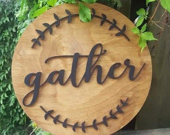 Wood gather circle sign - black text on stained wood round