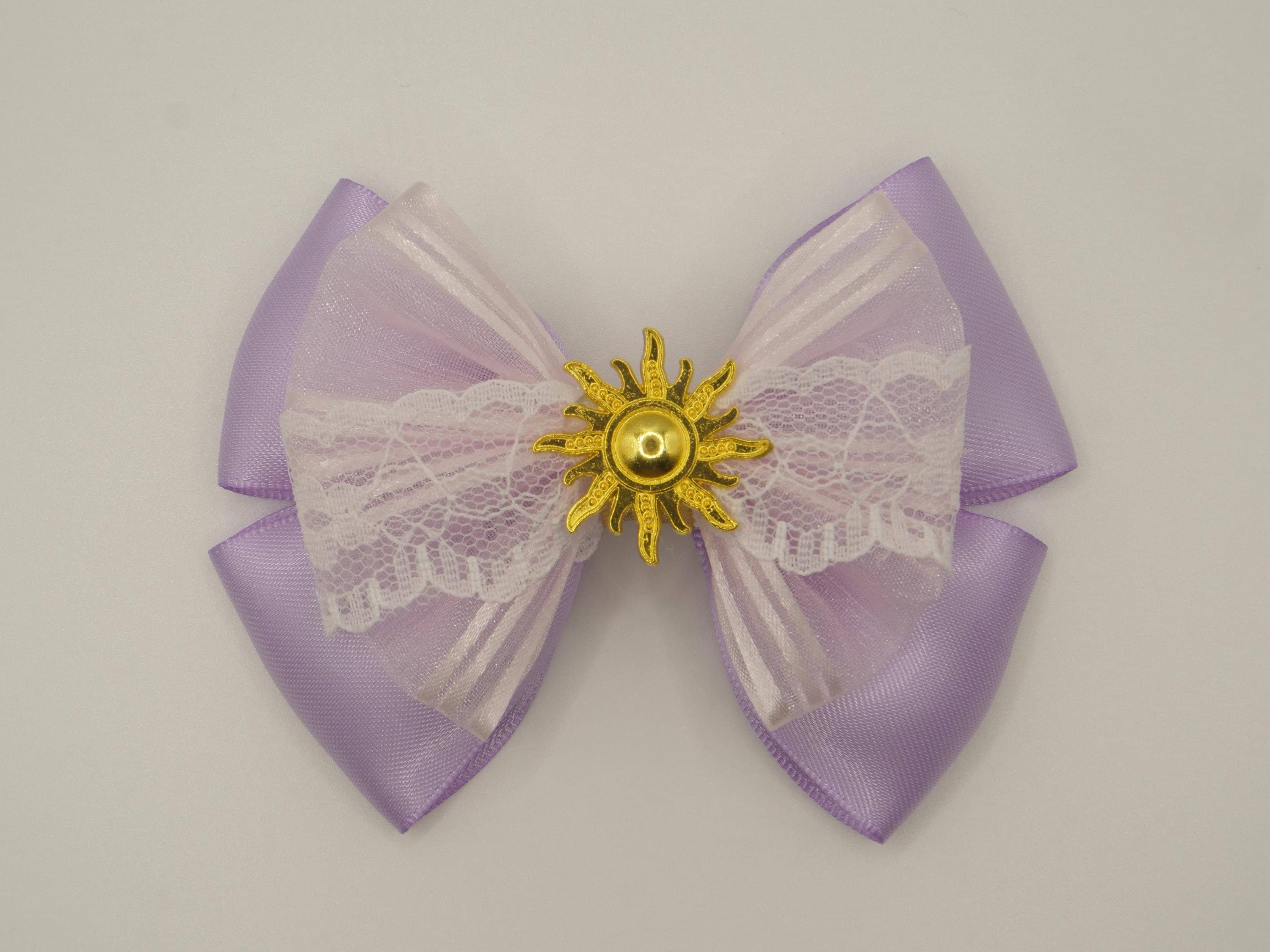 Disney Tangled Rapunzel Inspired Bow Disney Tangled Rapunzel Sundrop Flower Hair Bow | Hot Topic main image 4