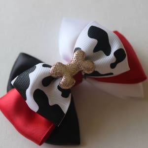 Arco boutique inspirado en Cruella de Vil
