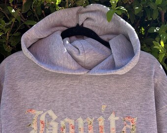 Sudadera con capucha "BONITA" con estampado floral menta victoriano