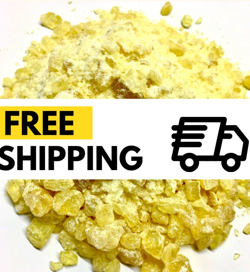 May include: A close-up of a pile of yellow, translucent, irregularly shaped crystals. The crystals are scattered on a white surface. The text "FREE SHIPPING" is displayed in black letters on a yellow background.