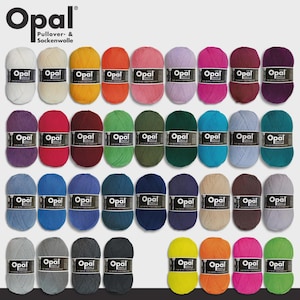 May include: A collection of Opal brand yarn skeins in various colors, including white, yellow, orange, pink, purple, green, blue, and gray. The yarn is labeled "Pullover- & Sockenwolle". The skeins are neatly arranged, showcasing a wide range of hues.