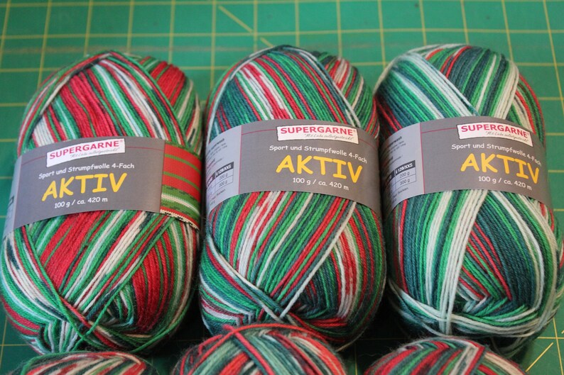 Cones, Skeins 4 Ply Aktiv Christmas 2023 Sock Yarn 100 Grams 460 Yards