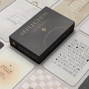 mindful ritual cards laid out symmetrically with quotes on pastel coloured cards showing