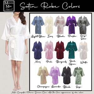 May include: A white satin robe with a matching belt is displayed next to a colour chart of satin robes. The chart includes robes in light blue, ivory, blush, purple, grey/silver, navy, pink, burgundy, dark green, white, champagne, lavender, black, and sage.
