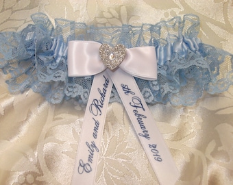 Personalised blue lace and satin wedding garter with glitter heart centrepiece