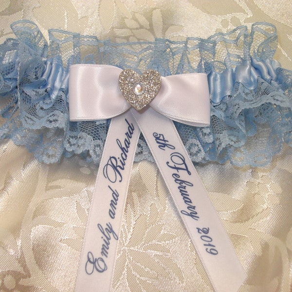 Personalised blue lace and satin wedding garter with glitter heart centrepiece