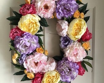 Vibrant Multi Color Peony Floral Wreath for Spring/Summer. Cottage Garden Style, Large Peony Blossoms. Purple, Pink, Yellow. Oval Grapevine.