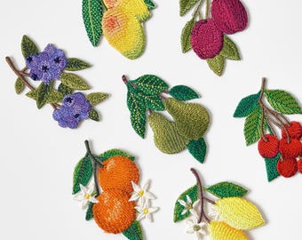 Parches termoadhesivos de frutas pequeñas: cereza, mango, arándano, limón, ciruela, pera y naranja.