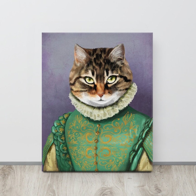May include: A tabby cat wearing a green and gold patterned costume with a white lace collar. The cat has green eyes and is looking directly at the viewer.