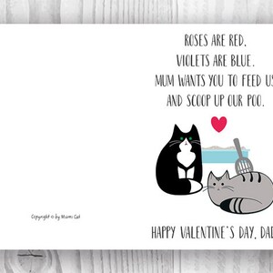May include: A Valentine's Day card for a cat dad. It features two cats, one black and white and one gray, with a red heart and a litter box. The text reads "Roses are red, violets are blue. Mum wants you to feed us and scoop up our poo. Happy Valentine's Day, Dad!"