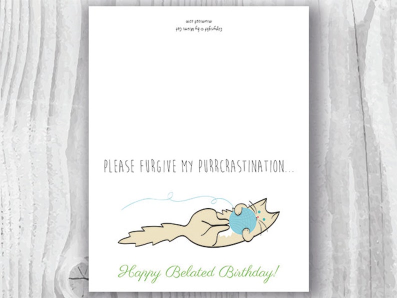 May include: A white card with a hand-drawn illustration of a cat playing with a ball of yarn. The text "Please forgive my purrcrastinaton... Happy Belated Birthday!" is written on the card.